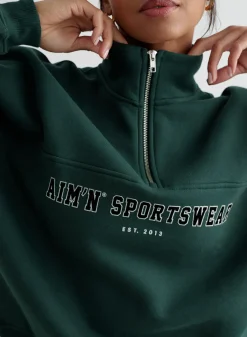 Varsity Sweat Half Zip*AIM’N Hot